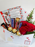 Sobre con rosas y chocolates