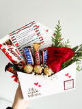 Sobre con rosas y chocolates