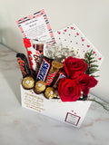 Sobre con rosas y chocolates