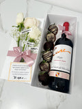 Caja sorpresa botella de vino, fresas con chocolate y rosas