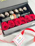 Caja sorpresa fresas con chocolate, botella de baileys y rosas