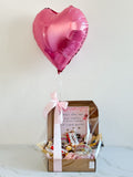 CAJA ABIERTA CON CHOCOLATES Y GLOBO CON HELIO