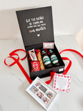Caja sorpresa con cervezas, chuches y marco de fotos